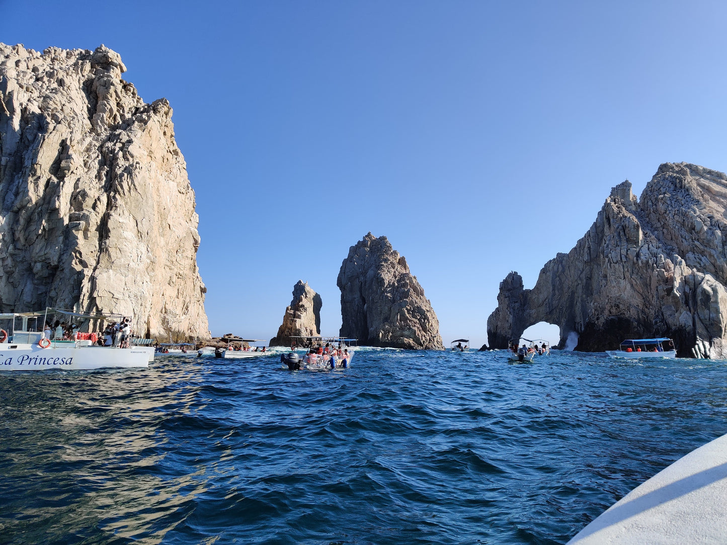 Boats on the ocean in Los Cabos Mexico during a small group trip excursion.