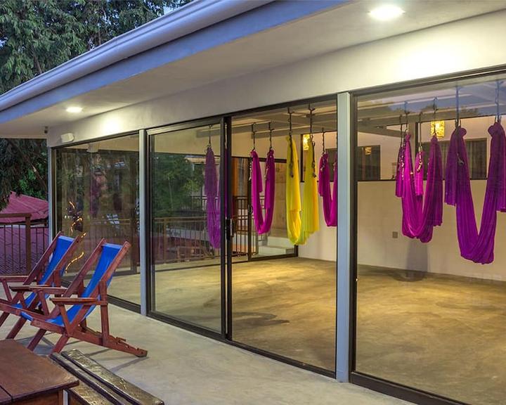 Indoor hammocks at La Botella De Leche Hostel in Tamarindo.