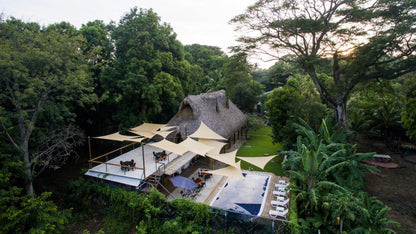 Aerial view of the Michanti hotel pool and outdoor seating area.