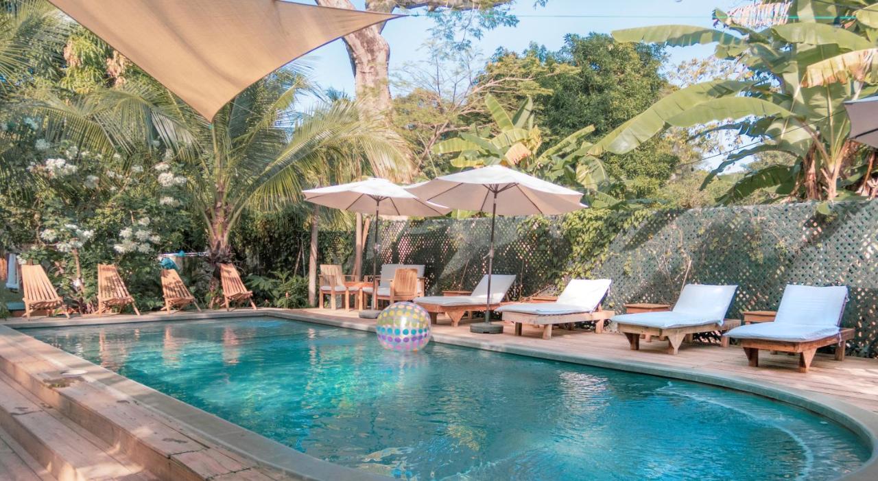 Pool with lounge chairs at the Michanti hotel group trip accommodation