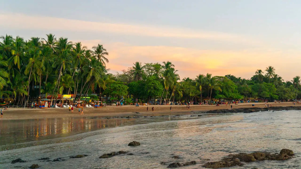 Tamarindo beach shoreline during the sunset.