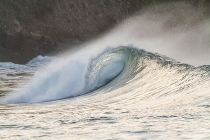 ocean wave near the cliff on mizata beach